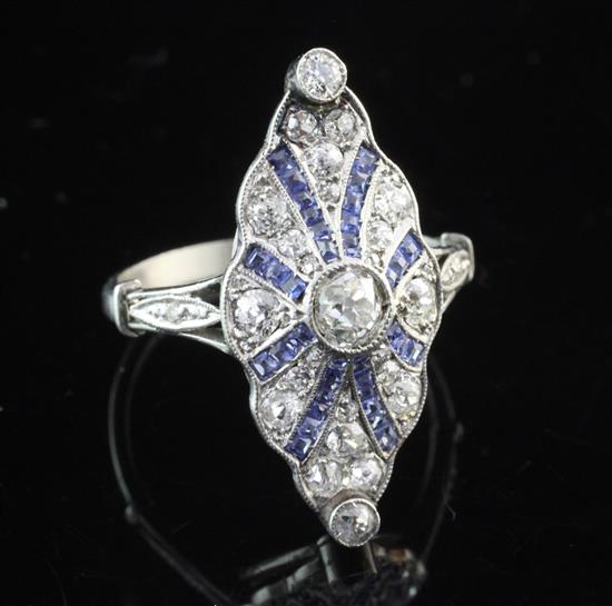 A 1930s Art Deco platinum, sapphire and diamond ring, size M.